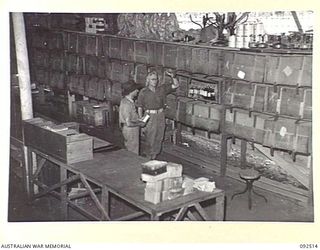 LAE AREA, NEW GUINEA. 1945-05-25. THE METHOD OF STORAGE OF DENTAL STORES AT 54 DENTAL UNIT. THE PICTURE WAS TAKEN AT THE REQUEST OF DR. WARNER, SCIENTIFIC LIAISON SECTION ATTACHED FIRST ARMY, WHO ..