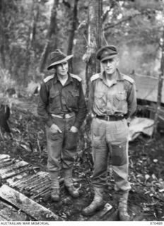 CRATER HILL, FINISTERRE RANGE, NEW GUINEA, 1944-02-16. VX112185 LIEUTENANT J. BETHUNE, MC, (1), THE ADJUTANT OF THE 58/59TH INFANTRY BATTALION WITH VX112181 MAJOR C.E. NEWMAN, MC, (2), ..