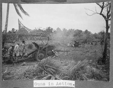 Members of the Tonga Defence Force of 2nd NZEF, firing a large gun in Tonga