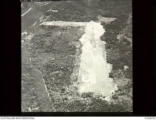 BUKA ISLAND, SOLOMON ISLANDS, NEW GUINEA. C. 1944. AERIAL VIEW OF BUKA AIR FIELD (LOOKING WEST SOUTH-WEST) IN THE NORTH SOLOMONS