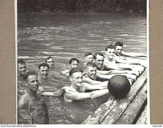 LALOKI RIVER, NEW GUINEA. 1943-11-09. A GROUP OF COMPETITORS IN THE 7TH AUSTRALIAN INFANTRY BRIGADE SIGNALS SWIMMING CARNIVAL. QX39827 SIGNALMAN D. W. SWEET (4); QX52822 PRIVATE TORRENCE (5); ..