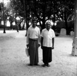 Two elders dressed for wedding feast at Falefono