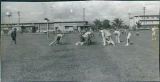 Football game on air force base, Japan or Hawaii, 1960s