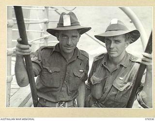 AT SEA. 1944-10-07. TWO MILITARY MEDAL WINNERS OF C COMPANY, 36TH INFANTRY BATTALION ABOARD THE DUTCH TROOPSHIP, "SWARTENHONDT" EN ROUTE FOR NEW BRITAIN. IDENTIFIED PERSONNEL ARE:_ NX191531 ..