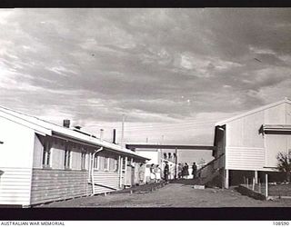 CANBERRA, ACT, 1945-05-29. ADMINISTRATION BUILDINGS OF THE LAND HEADQUARTERS SCHOOL OF CIVIL AFFAIRS IN THE GROUND OF DUNTROON MILITARY COLLEGE. THE SCHOOL WAS ESTABLISHED FOR THE PURPOSE OF ..