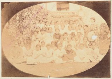 Group of children and Mrs Ellen Hutchin. From the album: Cook Islands