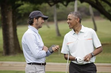 Barack Obama plays golf with Prime Minister Najib Razak, Joe Paulsen, and Mike Brush in Kaneohe Bay, Hawaii, December 24, 2014