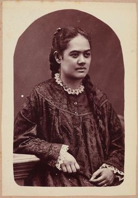 Portrait of woman in dark dress with long hair. From the album: Tahiti, Samoa and New Zealand scenes