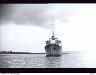 RABAUL, NEW BRITAIN, 1946-03-07. HMAS BARCOO (K375), OF THE ROYAL AUSTRALIAN NAVY, MOORED IN THE HARBOUR. (BOW VIEW)