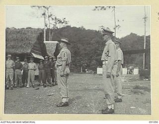 LAE AREA, NEW GUINEA. 1945-04-25. LIEUTENANT-COLONEL D.F. MILLAR, ADDRESSING THE ANZAC DAY PARADE AT 112 CONVALESCENT DEPOT. THE PARADE, HELD ON B COMPANY PARADE GROUND, WAS ATTENDED BY STAFF AND ..