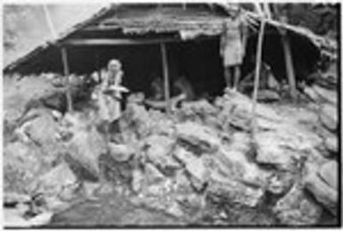 Folofo'u in front of his house at Uka'oi