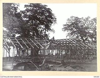 RABAUL, NEW BRITAIN, 1945-12-06. THE RECREATION HUT BEING BUILT AT 118 GENERAL HOSPITAL FOR AUSTRALIAN ARMY MEDICAL WOMEN'S SERVICE PERSONNEL. THE HOSPITAL IS LOCATED ON NONGA ROAD