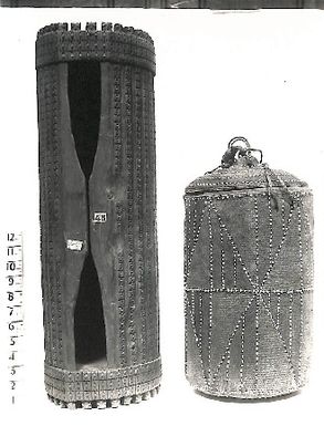 Photo of two wooden objects - one a 'tokere' (XX11/36)