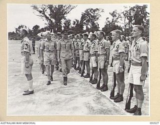 TOROKINA, BOUGAINVILLE. 1945-07-03. HIS ROYAL HIGHNESS, THE DUKE OF GLOUCESTER, GOVERNOR-GENERAL OF AUSTRALIA (1), ACCOMPANIED BY FLIGHT LIEUTENANT H.A. FARRAR (2), INSPECTING THE ROYAL NEW ZEALAND ..