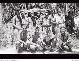 MADANG, NEW GUINEA. 12 AUGUST 1945. RAAF NORTHERN COMMAND HEADQUARTERS. MEN THE DAY AFTER A PARTY TO CELEBRATE THE ALLIED VICTORY OVER THE JAPANESE (VP DAY). LEFT TO RIGHT: BACK ROW: CURLY ..