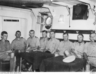 JACQUINOT BAY, NEW BRITAIN. 1944-11-08. OFFICERS OF THE RAN FRIGATE, BARCOO IN THE VESSEL'S WARDROOM