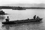 New kaiga vaka malaga (harvesting canoe) in lagoon off Vakula--isolation island of Lotomau in background
