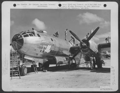 Air Force Personnel, Using Mops, Sponges, Etc., Wash Down The Boeing B-29 'Special Delivery' At A Base On Saipan, Marianans Islands. November 1944. (U.S. Air Force Number 64255AC)