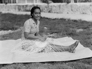 [Portrait of a Pacific island woman weaving]