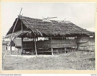 CAPE WOM, WEWAK AREA, NEW GUINEA, 1945-06-13. THE MESS HUT AND LIVING QUARTERS OF MAJ-GEN J.E.S. STEVENS, GOC 6 DIVISION AT HQ 6 DIVISION.