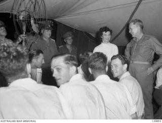 RABAUL, NEW BRITAIN. 1945-12-28. THE PRIME MINISTER OF AUSTRALIA, MR BEN CHIFLEY, ARRIVED BY PLANE TO VISIT MANY OF THE UNITS IN THE AREA. MR CHIFLEY TALKED WITH SOME OF THE PATIENTS AT THE 118TH ..