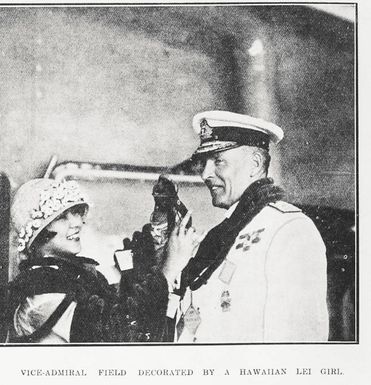 Vice-Admiral Field decorated by a Hawaiian lei girl