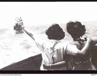 EN ROUTE TO KOIL ISLAND, NEW GUINEA, 1945-10-31. A VISIT TO KOIL ISLAND WAS ARRANGED BY THE RED CROSS FOR THE PURPOSE OF MEDICAL INSPECTION OF THE NATIVE INHABITANTS. THE VISITING PARTY CONSISTED ..