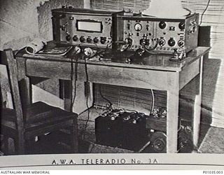 NEW GUINEA, C. 1942.  AN  A.W.A. TELERADIO NO. 3A INSTALLATION USED BY MEMBERS OF THE NEW GUINEA AIR WARNING WIRELESS COMPANY (NGAWW)