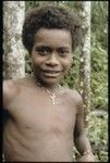 Young man with key around neck