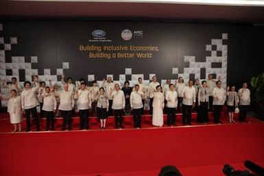 Barack Obama joins Asia Pacific Economic Cooperation Summit leaders and spouses for a group photo in Pasay, Metro Manila, Philippines, November 18, 2015