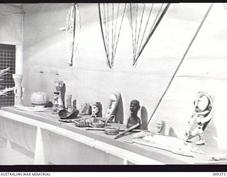 TOROKINA, BOUGAINVILLE, 1945-12-07. A NOVEL FEATURE OF THE ARTS AND CRAFTS EXHIBITION HELD AT TOROKINA WAS THE AMOUNT OF ART WORK SUBMITTED BY LOCAL NATIVES AND OTHERS THROUGHOUT THE ISLAND. THESE ..