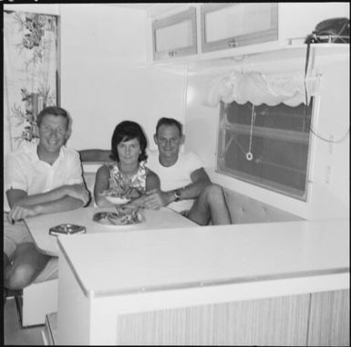Three people inside a caravan, Isle of Pines, New Caledonia, 1967 / Michael Terry