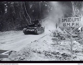 BOUGAINVILLE. 1945-04-04. A B SQUADRON, 2/4 ARMOURED REGIMENT MATILDA TANK APPROACHING THE PURIATA RIVER ON THE TOKO-DARARA ROAD DURING THE MOVE OF 8 TROOP UP FROM TOKO TO JOIN 7 AND 9 TROOPS WHO ..