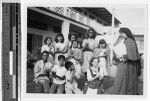 Sister Bernardine, MM, with deaf children, Waikiki, Honolulu, Hawaii, ca. 1940-1950