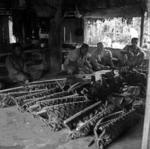 Preparation of feast? Food laid out in palm frond baskets