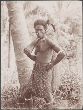 Portrait of a man from Fiu holding a gun, Malaita, Solomon Islands, 1906 / J.W. Beattie