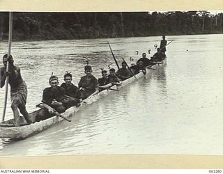 RAMU RIVER, FAITA AREA, NEW GUINEA. 1944-01-07. MEMBERS OF A PATROL OF THE 2/2ND COMMANDO SQUADRON RETURNING DOWN RIVER AFTER AN 8 DAY MARCH INTO JAPANESE HELD TERRITORY TOWARDS BOGADJIM. SHOWN ..