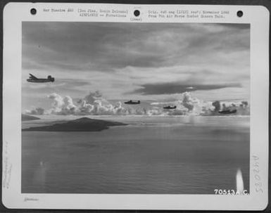 A Formation Of Consolidated B-24 "Liberators" Roars Toward Iwo Jima, Bonin Islands, Where They Will Strike Japanese Installations On The Tiny Islands Halfway Between Saipan And The Japanese Homeland. 21 October 1944. (U.S. Air Force Number 70513AC)