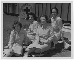 [Red Cross Staff Sit in Front of Fleet Hospital]