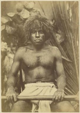 Portrait of Kalero, holding a club, New Caledonia, ca. 1870 / photographed by W. & E. Dufty