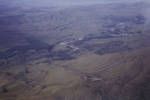 Aerial view of village, also European plantation (coffee), Eastern Highlands, [Papua New Guinea, 1963?], "Scenic"