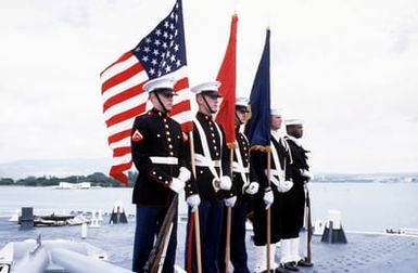 A color guard comprised of Marines and sailors aboard the battleship USS MISSOURI (BB-63) takes part in a ceremony prior to the vessel's departure from port at the beginning of exercise RIMPAC '87