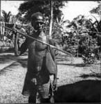Man with harpoon and bag