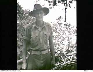 THE SOLOMON ISLANDS, 1945-05. AN AUSTRALIAN SOLDIER, UNARMED, AT NORTH BOUGAINVILLE. (RNZAF OFFICIAL PHOTOGRAPH.)