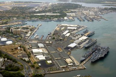 The US Navy (USN) Nimitz Class Aircraft Carrier USS ABRAHAM LINCOLN (CVN 72) (foreground right), is pictured among the multi-national ships moored side-by-side at Naval Base (NB) Pearl Harbor, Hawaii (HI), while participating the Rim of the Pacific (RIMPAC) 2006 Exercise, the world's largest biennial maritime exercise. RIMPAC 2006 brings together military forces from Australia, Canada, Chile, Peru, Japan, the Republic of Korea, the United Kingdom and the US