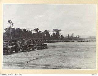 TOROKINA, BOUGAINVILLE, 1945-08-23. WRECKED MOTOR TRUCKS IN THE SUB DISPOSAL AREA, 8 VEHICLE PARK AUSTRALIAN ARMY ORDNANCE CORPS. (JOINS WITH 95509)