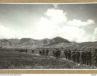 DUMPU, NEW GUINEA, 1943-10-05. GENERAL VIEW OF THE RAMU VALLEY WITH THE 2/27TH AUSTRALIAN INFANTRY BATTALION MOVING FORWARD