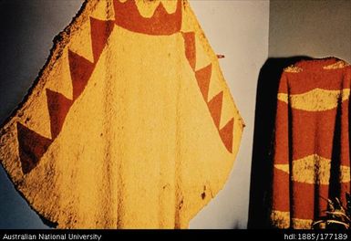 Bishop Museum - Kiwalao cloak (large), Kearny cloak (small)