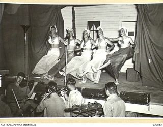 PAPUA, NEW GUINEA. 1942-07. THE MORESBY HULA GIRLS
