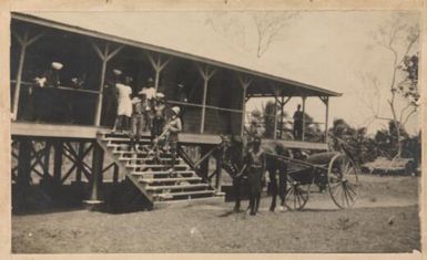 Boy with a horse and sulky in front of a house, Rabaul, New Guinea, 1914